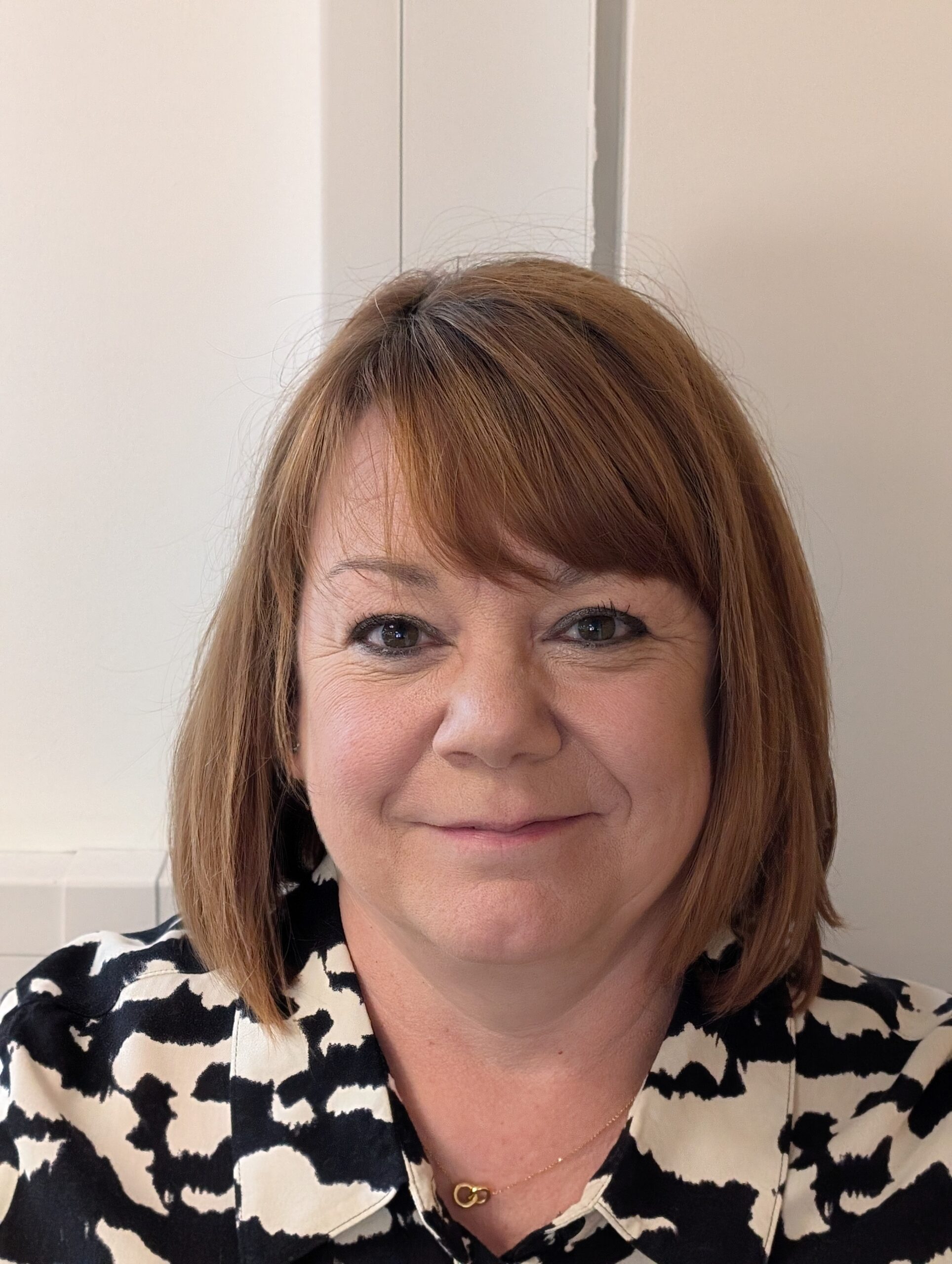 Claire Lang Senior Research Nurse Manager Cardiff Cancer Research Hub smiling head and shoulders picture